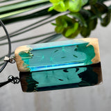 Pusteblumen Halskette aus Maserholz und türkisem Epoxidharz,  echte Löwenzahnsamen schweben im Harz sichtbar,  schwarze Lederkette, handgefertigter Naturschmuck Unisex