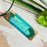 Pusteblumen Halskette aus Maserholz und türkisem Epoxidharz,  echte Löwenzahnsamen schweben im Harz sichtbar,  schwarze Lederkette, handgefertigter Naturschmuck Unisex