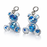 Bärchen-Anhänger aus Harz – Blaue Holoflakes (Edelstahlöse)