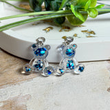 Bärchen-Anhänger aus Harz – Blaue Holoflakes (Edelstahlöse)